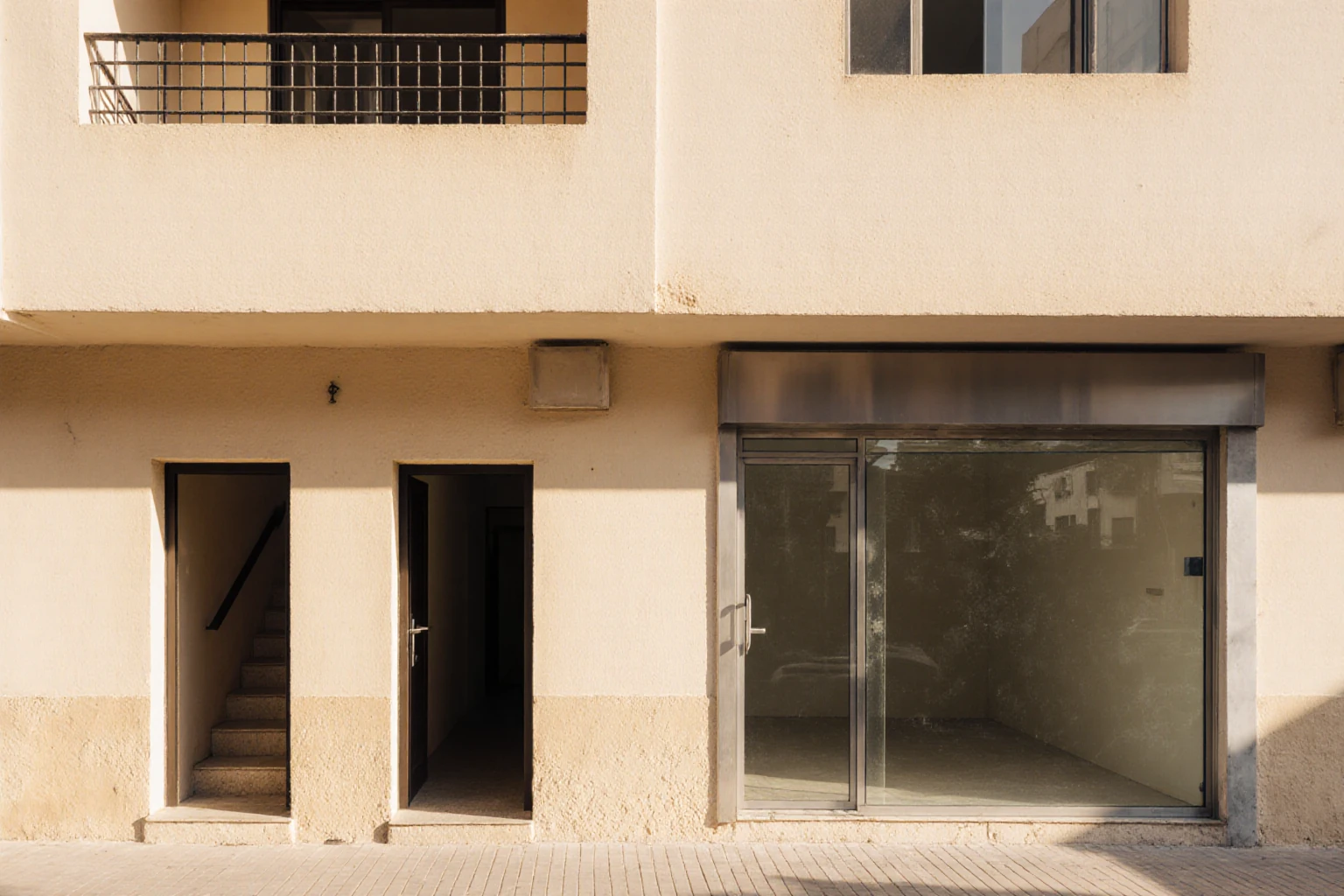Separate residential entrance beside ground-floor commercial premises